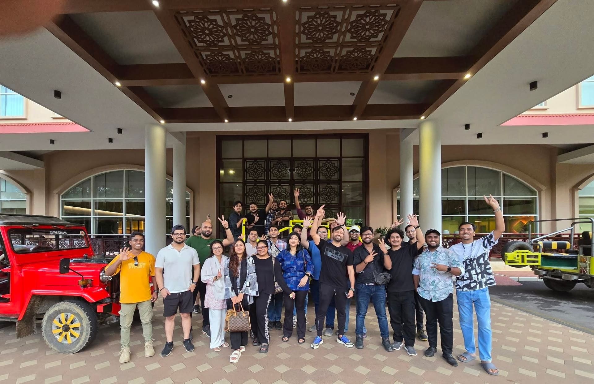 IMPIT team posing together in front of a resort during the Sreemangal team tour