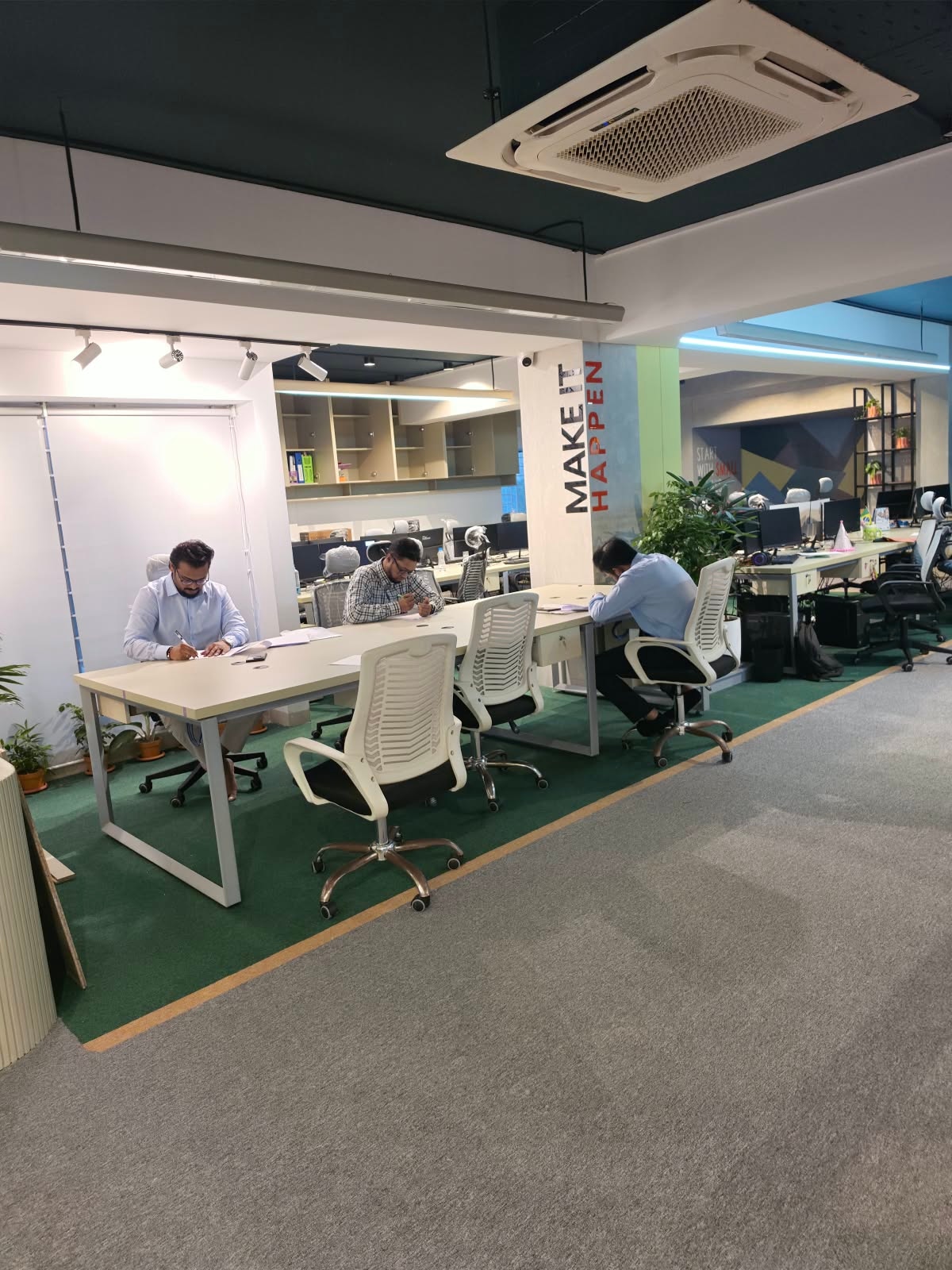 IMPIT team working across the open office floor